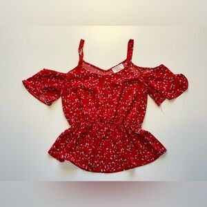 Red flowery blouse